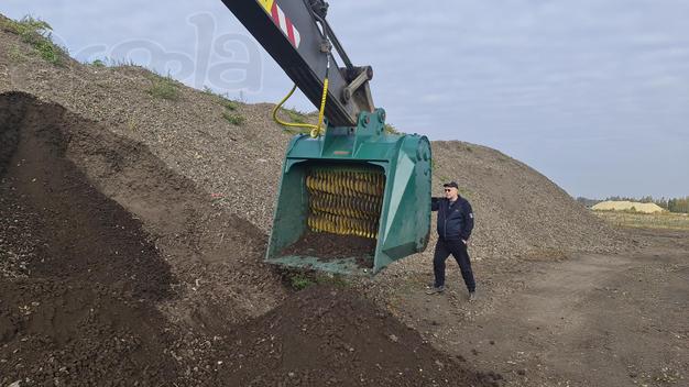 Высокопроизводительный и долговечный просетвающий валково-дробильный ковш